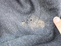 Uniformjacke dunkelblaugrau, erinnert vom Schnitt an Österreich, allerdings will der Kragen nicht dazu passen. Wenige kleinere Mottenschäden, sonst gut
