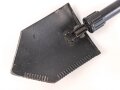 U.S. Army 1975 dated folding shovel in carrier from 1985. Uncleaned