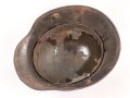 1.Weltkrieg , Stahlhelm Modell 1917. Hersteller ET64 ( Eisenhüttenwerk Thale A.G., Thale a/Harz)  Ungereinigtes Stück, Nieten und Ring original und vermutlich ursprünglich zugehörig.