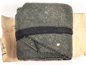 1.Weltkrieg " Rundschnitt Wickelgamasche München" mit der originalen Umverpackung einen feldgrauen Angehörigen der Gebirgstruppe darstellend.
