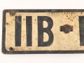 Nummernschild aus der Zeit des 2. Weltkrieg, wohl für Lastkraftwagen. Maße 13 x 60cm