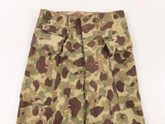 U.S. Army, 1943 dated Camo HBT combat trousers. Unissued, legs cut down, missing labels
