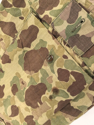U.S. Army, 1943 dated Camo HBT combat trousers. Unissued, legs cut down, missing labels
