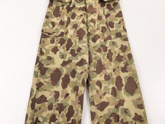 U.S. Army, 1943 dated Camo HBT combat trousers. Unissued, legs cut down, missing labels