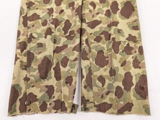 U.S. Army, 1943 dated Camo HBT combat trousers. Unissued, legs cut down, missing labels