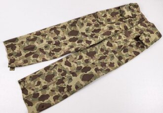 U.S. Army, 1943 dated Camo HBT combat trousers. Unissued, legs cut down, missing labels