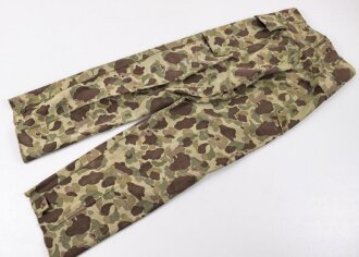U.S. Army, 1943 dated Camo HBT combat trousers. Unissued, legs cut down, missing labels