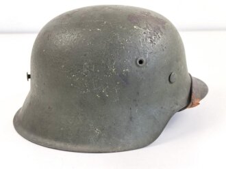 Heer, original getarnter Stahlhelm Modell 1942. Zusammengehöriges Stück, ungereinigt. Hersteller ckl 64