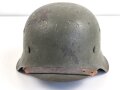 Heer, original getarnter Stahlhelm Modell 1942. Zusammengehöriges Stück, ungereinigt. Hersteller ckl 64