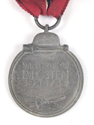 Medaille Winterschlacht im Osten, Hersteller 4 im Bandring für Steinhauer & Lück. Am Band