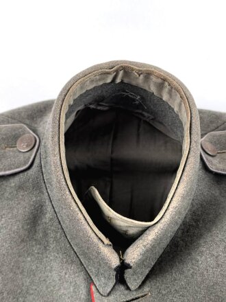 1.Weltkrieg Preußen, feldgrauer Waffenrock Modell 1910 für einen Angehörigen im Telegrapghen Bataillion 5. Eigentumstück mit kleinem Mottenschaden am rechten Ärmel, sonst in sehr gutem Zustand