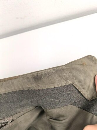 1.Weltkrieg Preußen, feldgrauer Waffenrock Modell 1910 für einen Angehörigen im Telegrapghen Bataillion 5. Eigentumstück mit kleinem Mottenschaden am rechten Ärmel, sonst in sehr gutem Zustand