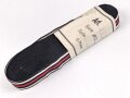 Bündel Ordensband  für die Bandspange zum Ehrenkreuz für Frontkämpfer / Kriegsteilnehmer.  15mm Breite. In der originalen Banderole, laut dieser 10 Meter