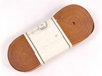 Bündel Ordensband  zur Bandspange für Schutzwall Ehrenzeichen.  Breite 15mm . In der originalen Banderole, laut dieser  25 Meter