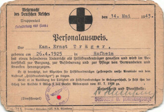 Wehrmacht des Deutschen Reiches, Truppenteil Flakabteilung 697 (Trop.) "Personalausweis" für einen Hilfskrankenträger, datiert 1943
