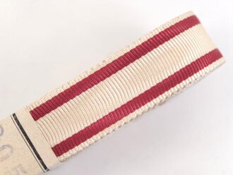 Österreich, Bündel Band zur Bandspange des Jubiläumskreuz 1908. Breite 15mm, in der originalen Banderole, laut dieser 10 Meter