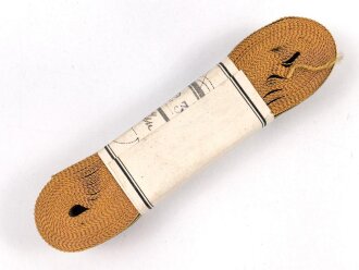 Württemberg, Bündel Ordensband für eine Bandspange zum Charlottenkreuz. Breite 15mm, in der originalen Banderole, laut dieser 10 Meter