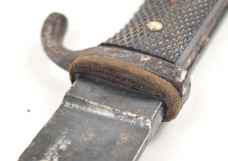 Fahrtenmesser für Angehörige der Hitlerjugend. Frühe Ausführung mit Devise, Hersteller M7/8. Raute wackelt leicht wie es sein soll. Ungereinigt