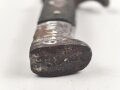 Fahrtenmesser für Angehörige der Hitlerjugend. Frühe Ausführung mit Devise, Hersteller M7/8. Raute wackelt leicht wie es sein soll. Ungereinigt