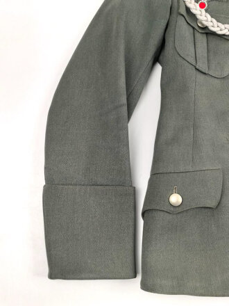 Geschönte Feldbluse Modell 1936 für Kraftfahrtruppe des Stabsfeldwebel Brinkmann.. Meiner Ansicht nach so zusammengehörig. Guter Zustand