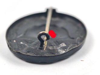 Verwundetenabzeichen schwarz, Buntmetall lackiert, Hersteller L/11 für Deumer Lüdenscheid. getragenes Stück