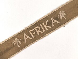 Ärmelband " Afrika" sogenannte Kamelhaarausführung. Getragenes Stück