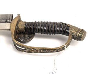 Preussen, Infanterie Offiziers Degen Modell 1889 . Das Grifftsück in Luxusausführung, die Scheide vernickelt. Klinge ohne Hersteller
