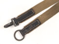 Leder/ Leinenriemen geschwärzt, Breite knapp 4cm, eiserne Beschläge Länge etwa 90cm, Alter und Herkunft unbekannt