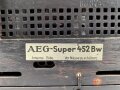 Wehrmacht Rundfunkempfänger AEG Batteriesuper 452 Bw. Originallack, optisch sehr gut, der Deckel lose beiliegend, Rückwandschrauben ohne Funktion.Technische Funktion nicht geprüft