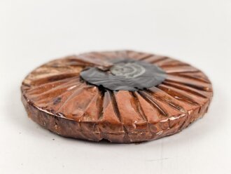 Halber Inhalt einer  Scho-ka-kola Dose Wehrmacht