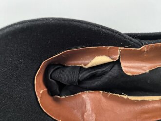 Schwarze Feldmütze ohne jegliche Stempelung. Alter und Herkunft unbekannt