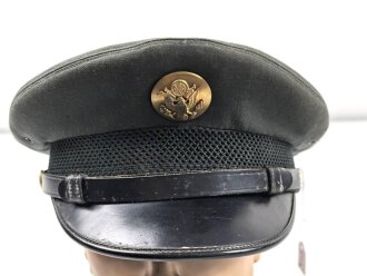 U.S. Army Schirmmütze aus der Zeit des Vietnamkrieg. Grösse 7 1/8, datiert 1972. Ungereinigtes Stück  mit Namensetikett.