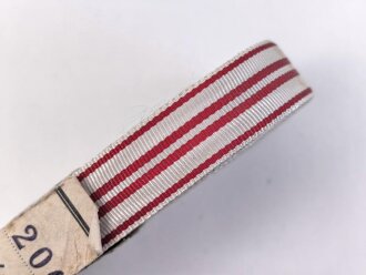 Österreich, Bündel Band für die Bandspange zur zur Kriegs-Erinnerungsmedaille 1914 - 1918. Breite 15mm, in der originalen Banderole, laut dieser 20 Meter