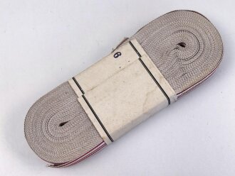 Österreich, Bündel Band für die Bandspange zur zur Kriegs-Erinnerungsmedaille 1914 - 1918. Breite 15mm, in der originalen Banderole, laut dieser 20 Meter