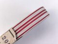 Österreich, Bündel Band für die Bandspange zur zur Kriegs-Erinnerungsmedaille 1914 - 1918. Breite 15mm, in der originalen Banderole, laut dieser 20 Meter