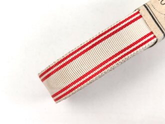 Österreich, Bündel Band zur Bandspange der Rot Kreuz Medaille . Breite 15mm , in der originalen Banderole, laut dieser 10 Meter