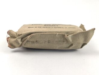 Vietnamkrieg, in China hergestelltes Verbandpäckchen, so bei der Nordvietnamesischen Armee und dem Vietkong verwendet.