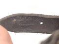 Stahlhelm Kinnriemen Wehrmacht, das Leder vollständig ausgetrocknet, datiert 1940