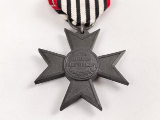 Preussen, Verleihungsurkunde zum Verdienstkreuz für Kriegshilfe, ausgestellt auf einen Gemeidevorsteher am 3.Juni 1918. Mehrfach gefaltet, dazu das Verdienstkreuz am Band