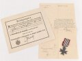 Preussen, Verleihungsurkunde zum Verdienstkreuz für Kriegshilfe, ausgestellt auf einen Gemeidevorsteher am 3.Juni 1918. Mehrfach gefaltet, dazu das Verdienstkreuz am Band