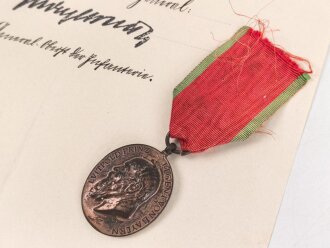 Bayern , Besitzzeugnis zur Jubiläumsmedaille 1905. Mittig gefaltet, dazu die Medaille am Band