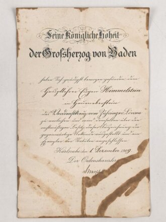 Baden, Verleihungsurkunde zum Verdienstkreuz vom Zähringer Löwen, ausgestellt 1909. Verschmutzt und mehrfach gefaltet