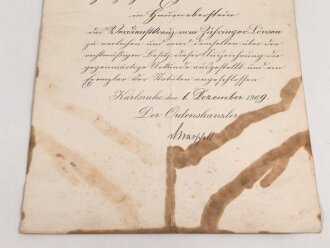 Baden, Verleihungsurkunde zum Verdienstkreuz vom Zähringer Löwen, ausgestellt 1909. Verschmutzt und mehrfach gefaltet