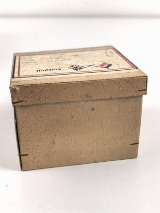 1.Weltkrieg, Feldpostpaket  mit zu befüllender Metalldose. Maße des Karton 7,5 x 10,5 x 10,5cm