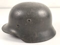 Stahlhelm Modell 1940 für Angehörige des Heeres. In allen Teilen original und zusammengehörig, undeutlich gestempelt ? 64.