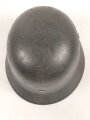 Stahlhelm Modell 1940 für Angehörige des Heeres. In allen Teilen original und zusammengehörig, undeutlich gestempelt ? 64.