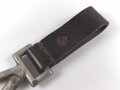 Vorrichtung zum Kabelführen, Karabinerhaken an Koppelschlaufe.  Vermutlich militärisch, taucht allerdings in keiner mir bekannten Vorschrift auf