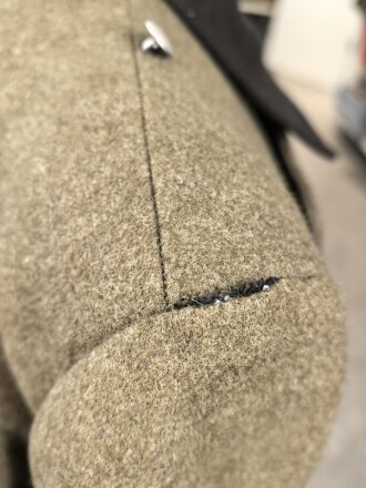 Mantel für Angehörige im NS Kraftfahrkorps NSKK. getragenes , ungereinigtes Eigentumstück.