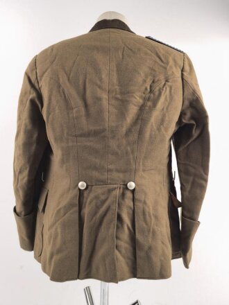 Dienstrock für Angehörige im NS Kraftfahrkorps NSKK. Das Schulterstück originalvernäht, RZM Etikett in der Tasche. Ungereinigt
