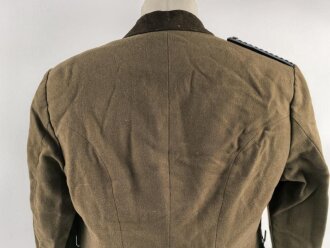 Dienstrock für Angehörige im NS Kraftfahrkorps NSKK. Das Schulterstück originalvernäht, RZM Etikett in der Tasche. Ungereinigt